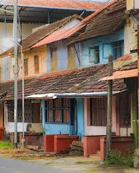 Traditional Kerala houses with tiled roofs