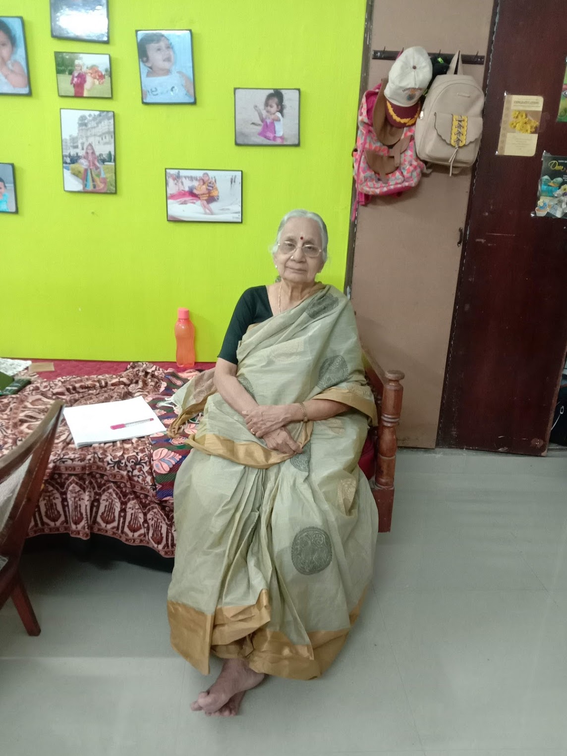 Thankam Mami seated at home