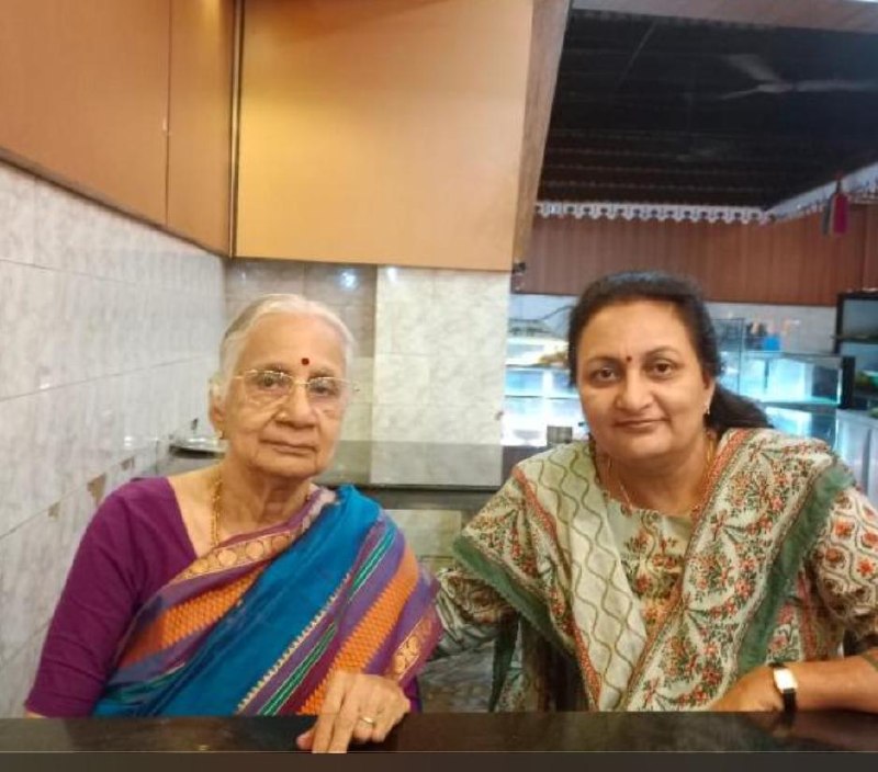 Thankam Mami seated with her daughter Padma
